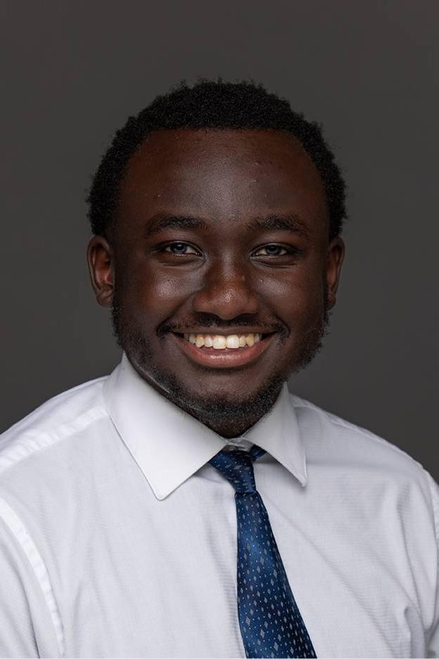 Keith Chemjor smiling for his GVSU headshot